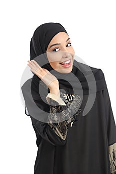Arab saudi emirates woman gesturing listening with a hand on ear