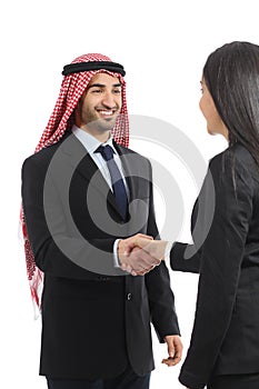 Arab saudi happy businessman handshaking in a negotiation