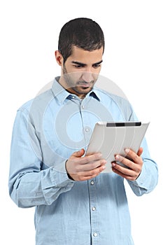 Arab saudi man reading a tablet reader isolated