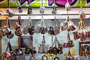 Arab souvenir shop with copper utensils: teapots, coffee pots and other utensils