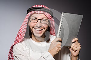 Arab student with book