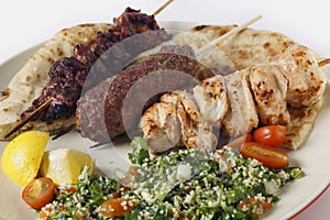 Arab style barbecue meal with tabouleh