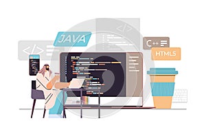 arab web developer creating program code on laptop screen development of software and programming concept