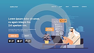 arab web developer creating program code on laptop screen development of software and programming concept