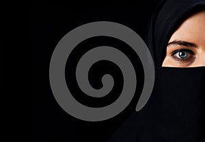 Arab woman with black veil photo