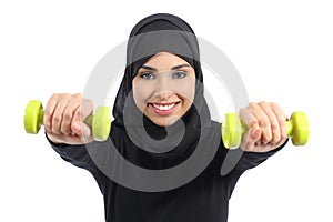 Arab woman doing weights fitness concept