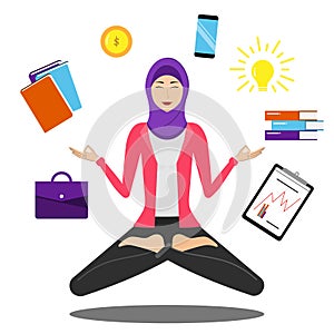 Arab woman with hijab in lotus yoga pose. Young woman wearing hijab, practicing yoga on the job. The concept of Healthy