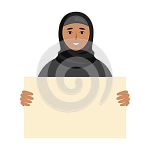 Arab woman holding empty sign in her hands. Happy female with a poster.