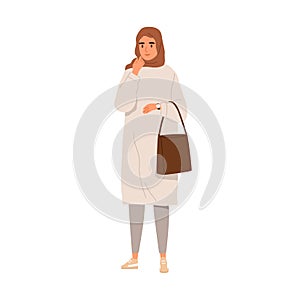 Arab woman in modern outfit portrait. Muslim female wearing headscarf, tunic and sneakers. Arabian person in hijab and