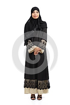 Arab woman posing standing wearing a hijab