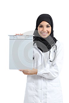 Arab woman showing a blank medical history folder