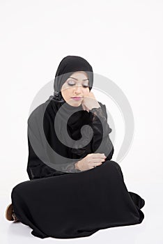 Arab woman Sitting on the floor