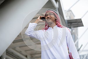 Arabian arab businessman talking on mobile phone