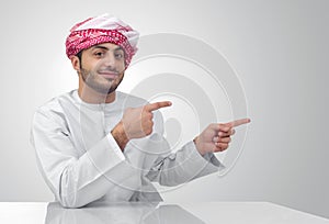 Arabian business man pointing his fingers isolated