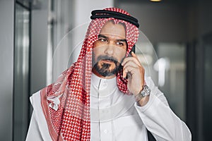 Arabian businessman making a phone call