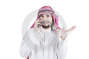 Arabian businessman making a phone call