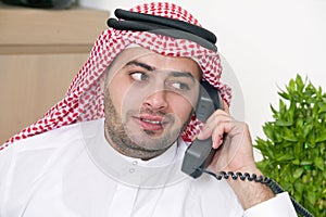 Arabian Businessman talking on phone