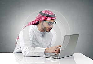 Arabian businessman working in his office