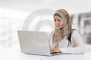 Arabian Customer Representative with headset