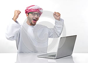 Arabian excited businessman expressing success