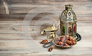 Arabian lantern, dates rosary. Islamic holidays concept