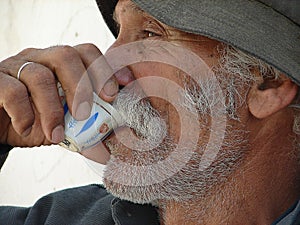 Arabian man drinking arabian coffee