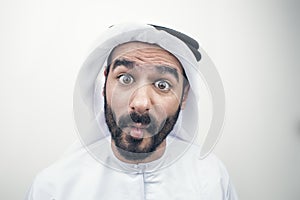 Arabian man sticking out his tongue, Arabian guy with funny expr