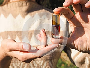 Arabian oud attar perfume or agarwood oil fragrances in mini bottle.