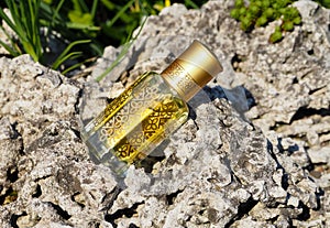 Arabian oud attar perfume or agarwood oil fragrances in mini bottle.