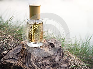 Arabian oud attar perfume or agarwood oil fragrances in mini bottle.