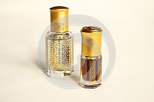 Arabian oud attar perfume or agarwood oil fragrances in mini bottles.