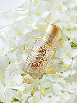 Arabian oudh attar perfume or agarwood oil fragrances with Jasmine in mini bottle.