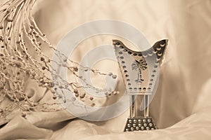 Arabian oudh perfume with date palm branch