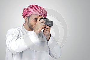 Arabian photographer taking pictures