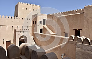 Crenellated Parapets and Staircases in Nizwa Castle photo