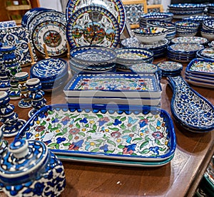 Arabian traditional colored pottery and clocks sold at local store