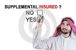 Arabian worker approving supplemental insured