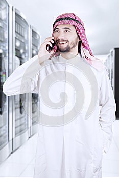 Arabian worker talking on the phone