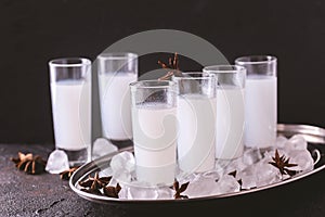 Arabic alcohol Raki with anis and ice. Arak, Ouzo
