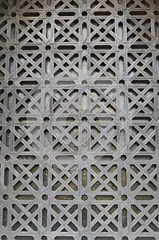 Arabic arch encloses acarved jali screen