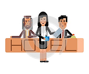 Arabic and asian receptionists at hotel reception