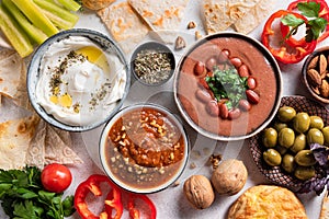 Arabic breakfast with labneh, foul and muhammara dips