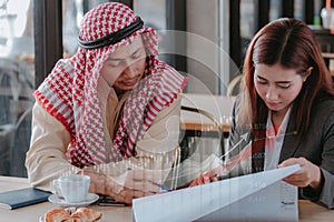 Arabic business people working together on project at office