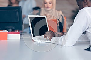 Arabic business woman wearing hijab,working in startup office.