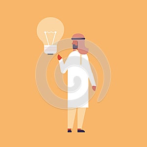 Arabic businessman holding light lamp new idea innovation concept arab business man creative inspiration male cartoon