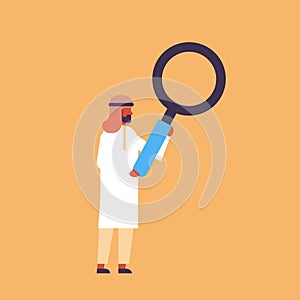 Arabic businessman holding magnifying zoom glass searching detecting analyzing concept arab man ready inspect male