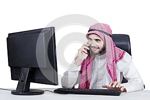 Arabic businessman talking on the cellphone