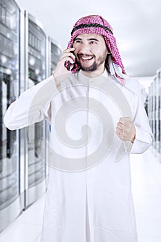 Arabic businessman talking on the phone