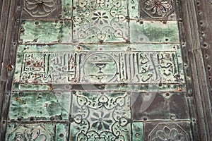 Arabic Calligraohy on door at he Umayyad Mosque, also known as the Great Mosque of Damascus