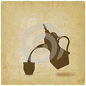 Arabic coffee pot old background photo